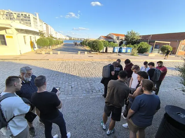 Two teams study their tablets at a checkpoint by the Thessaloniki port during Operation Mindfall, a Salty Soil AR escape game