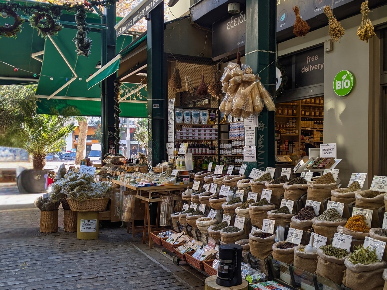 Entrance to the Thessaloniki spices market visited during a Salty Soil food tour, with herbs, local products, and market stalls on display